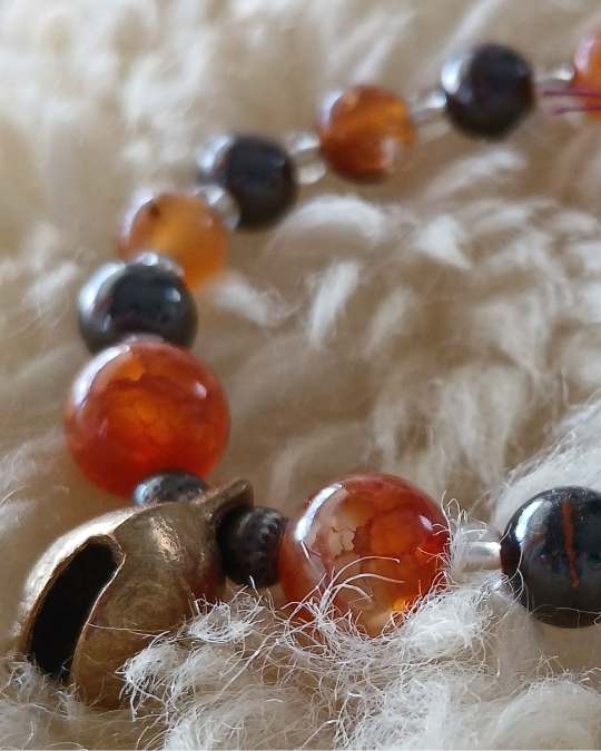 Orange Calcite and Bell Bracelet